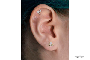 Triple crystal flower ear piercing piercinginspiration®